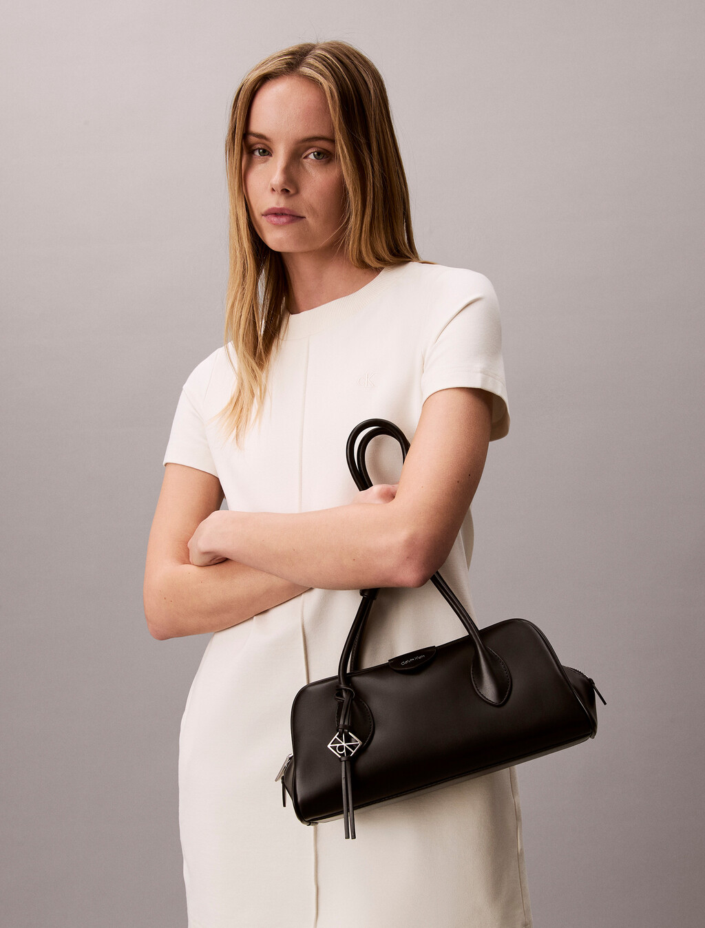Bolso de hombro con tres compartimentos