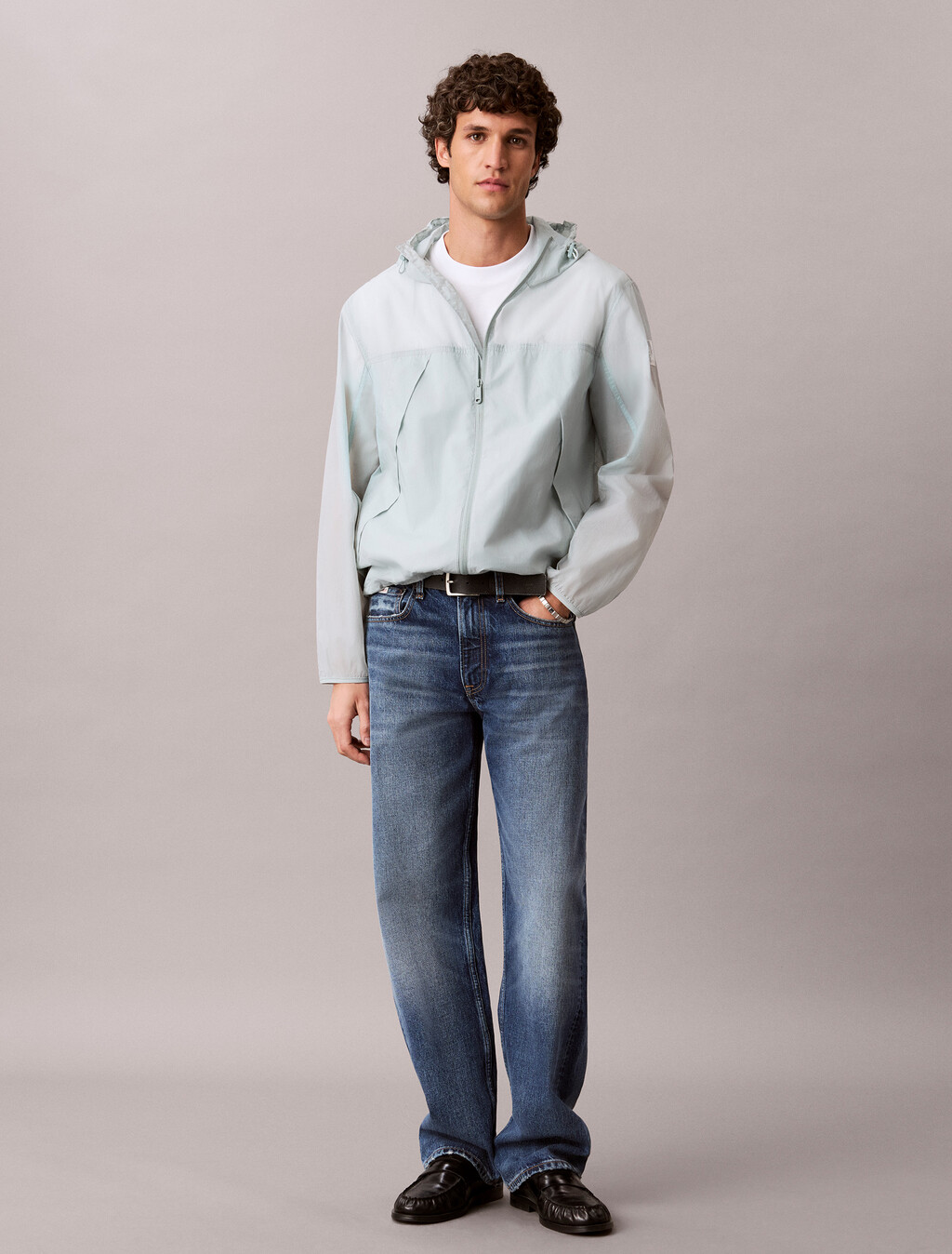 Chaqueta impermeable de nailon con capucha plegable