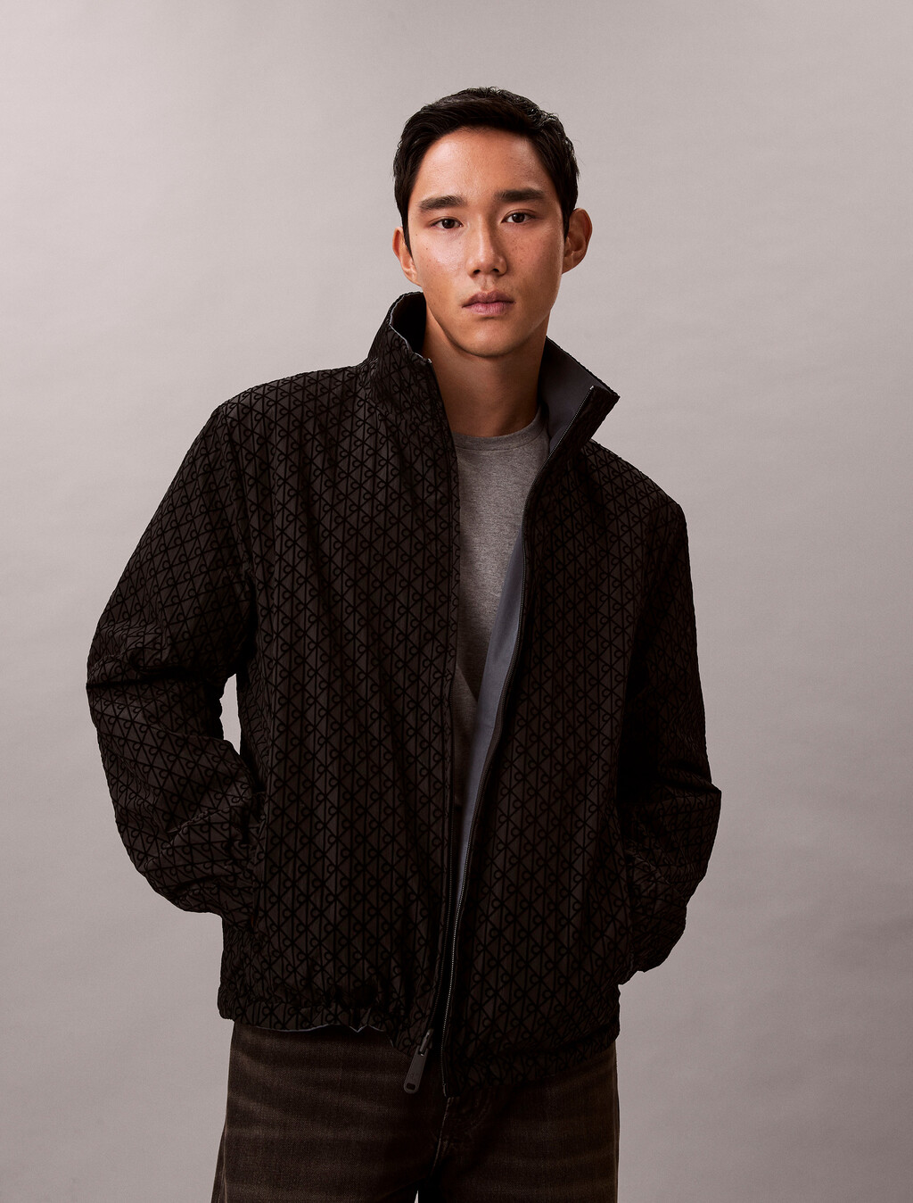 Chaqueta reversible de nailon con emblema