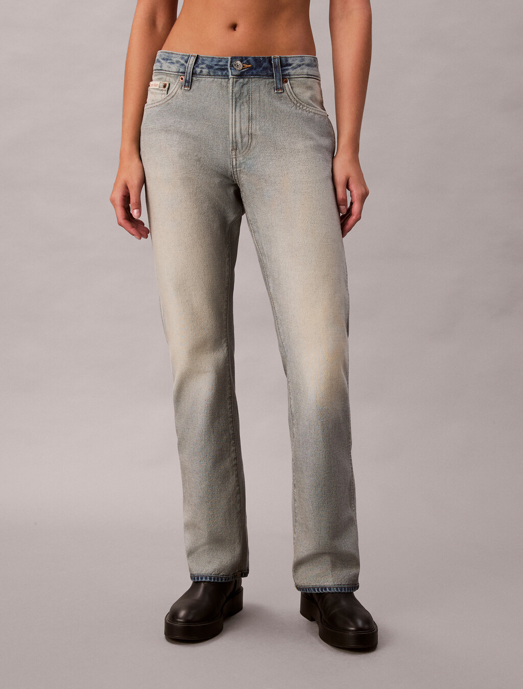 Pantalones vaqueros bootcut holgados con borde de tejido