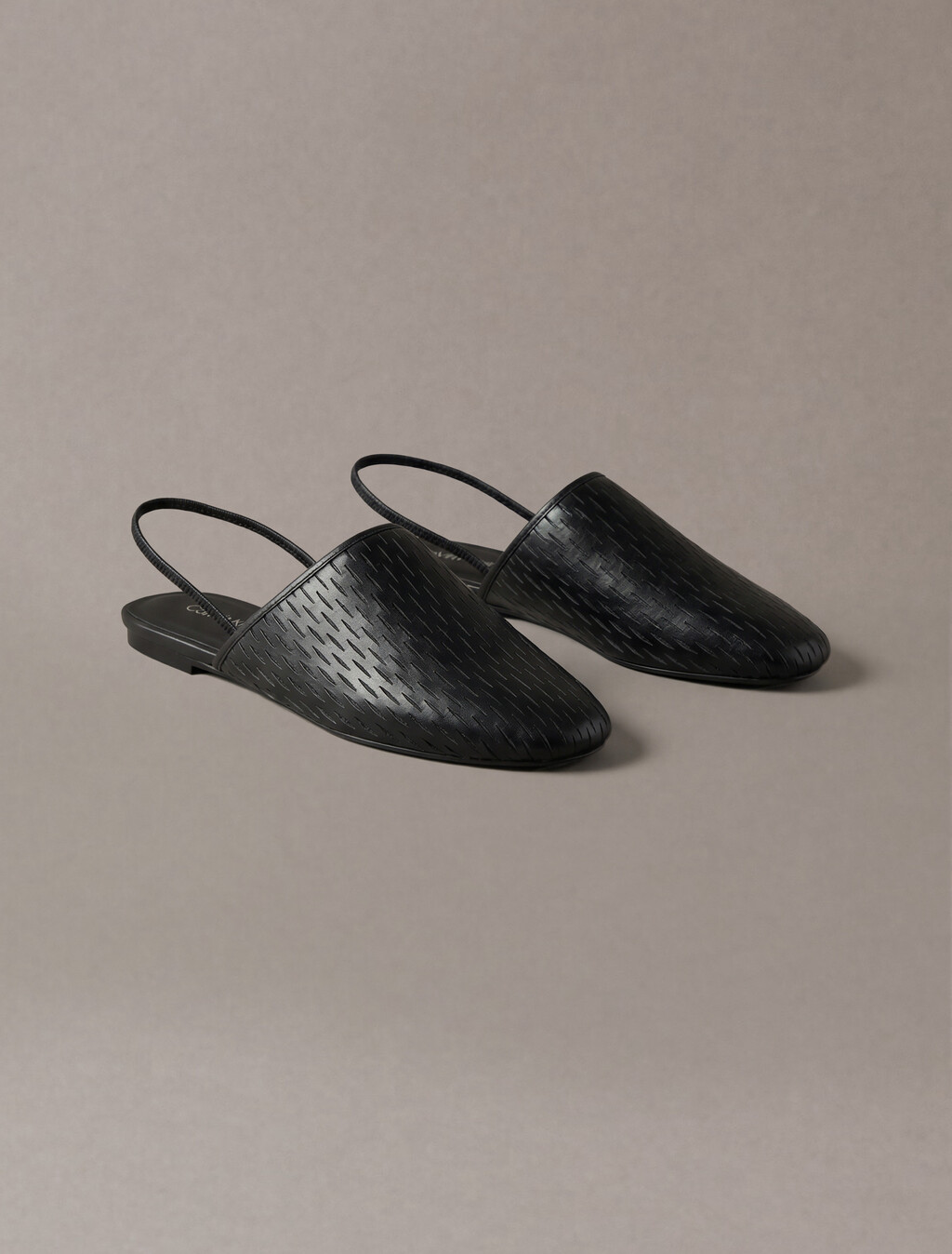 Mules de cuero con correa