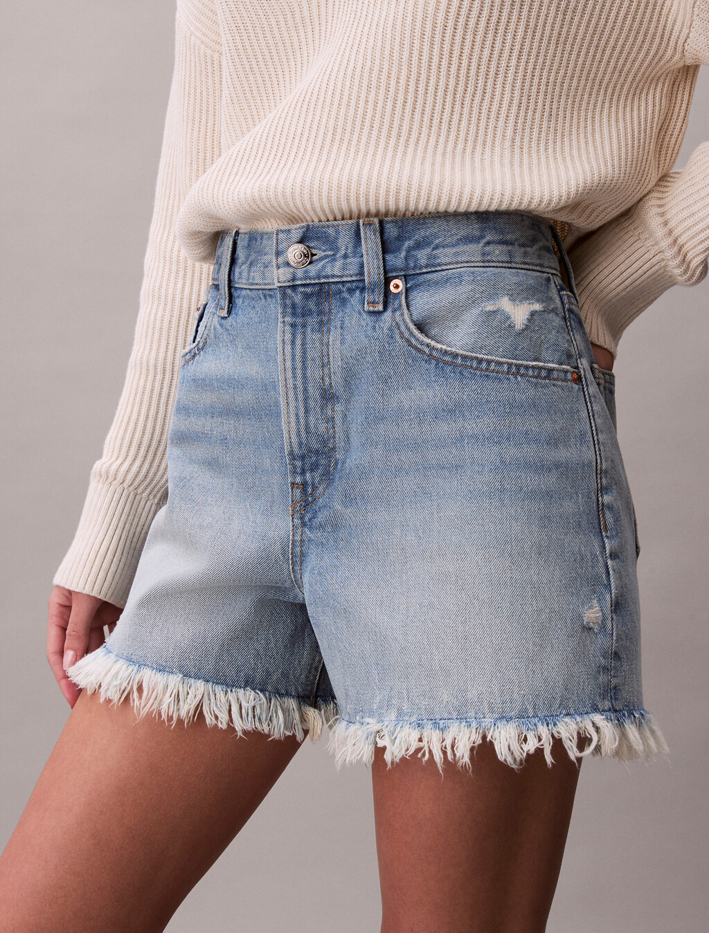 Pantalones cortos de mezclilla desgastada estilo años 90